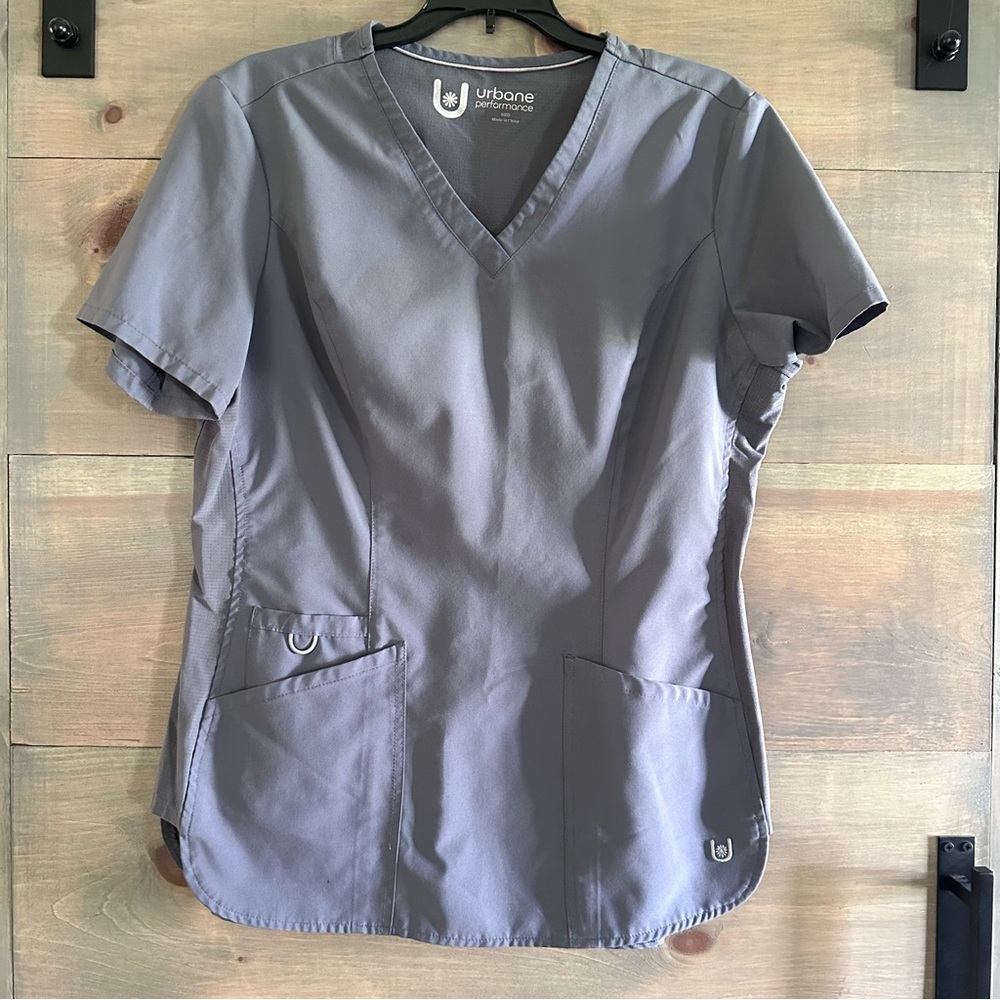 Women’s scrub top sizes Medium. TWO available. Identical tops.